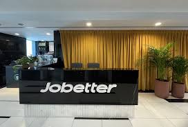 A reception desk with the Jobetter corporate logo