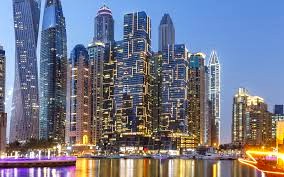 Regus - Residences in Marina Gate, Dubai at dusk