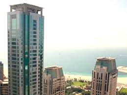 A shot of Servcorp - Al Habtoor Business Tower, Dubai Marina, Dubai with the Persian Gulf in the background
