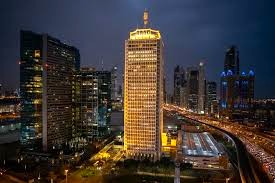 An external shot of Maktabi - Sheikh Rashid Tower, DWTC, Dubai, UAE at dusk