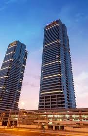 An exterior view of The Place - Mazaya Business Center AA1, JLT, Dubai