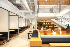 Coworking desks and booths at WeWork - The Domain, 11801 Domain Boulevard, Austin, TX 78758