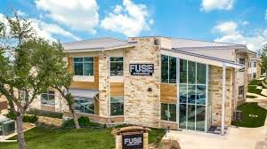 An exterior view of Fuse Workspace - 14425 Falcon Head Boulevard, Building E, Austin, Texas, 78738