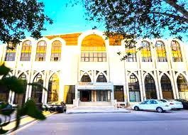 An external shot of Super Office - Building No. 44, Ibn Katheer Street, King Abdul Aziz, Riyadh 13334 showing car parking